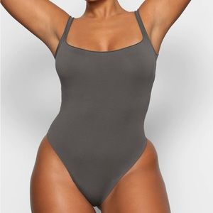 NWT Skims raw edge bodysuit gunmetal size small